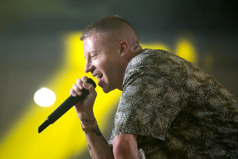 Macklemore's 'f*** America' Slogan Sparks Backlash