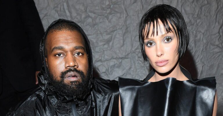 Kanye West And Bianca Censori Look Down At A Garbage