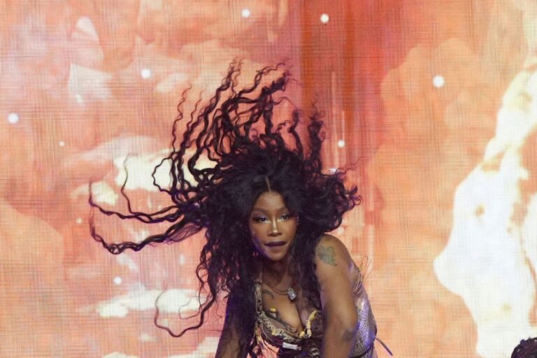 SZA dances on pole in sheer top and barely there