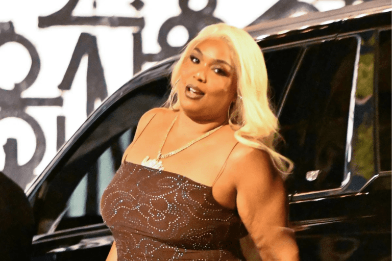 Lizzo swears she'll be busting her belly in sexy bikini
